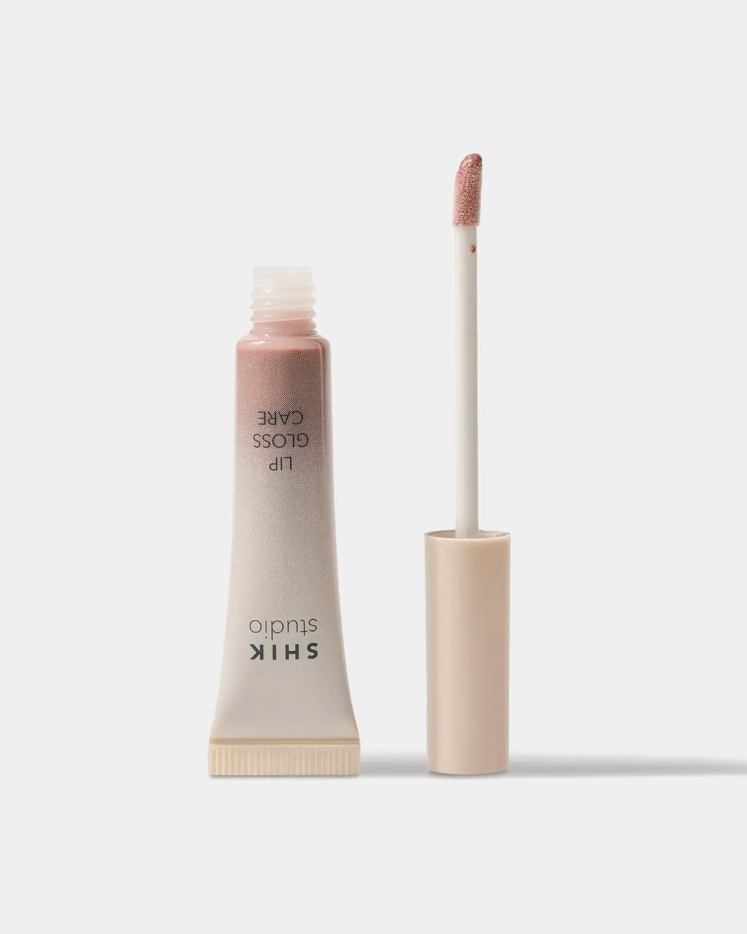 Купить Блеск для губ ухаживающий care 102 naked SHIK