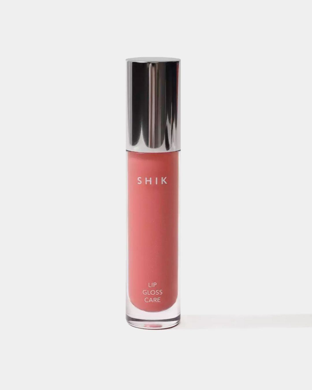 Купить Блеск для губ ухаживающий intense 01 pale pink SHIK