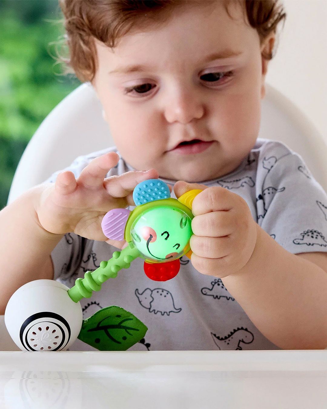 Купить Погремушка светящийся цветок HAPE