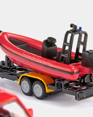 Купить Пожарная машина land rover defender с лодкой SIKU